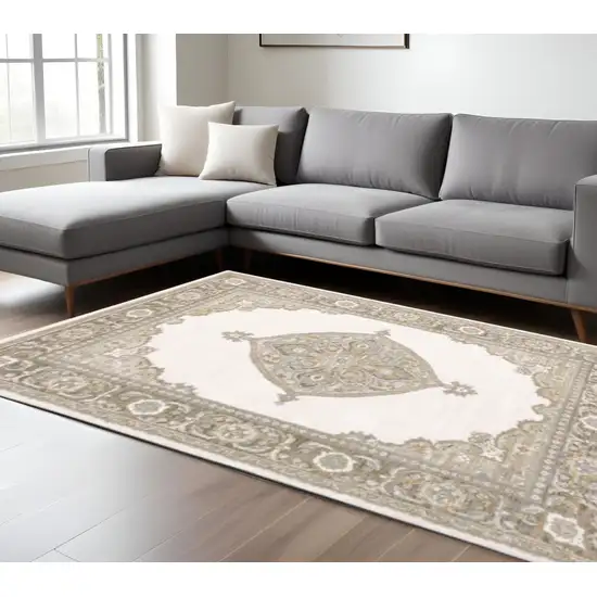 Beige and Ivory Oriental Power Loom Area Rug Photo 1