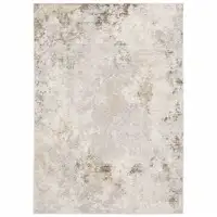 Photo of Beige Ivory Tan Grey And Brown Abstract Power Loom Stain Resistant Area Rug