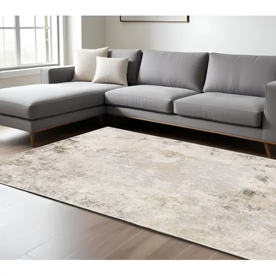 Ivory And Beige Abstract Distressed Area Rug Photo 1