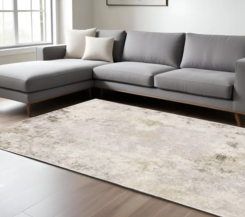 Beige and Ivory Abstract Power Loom Area Rug Photo 1