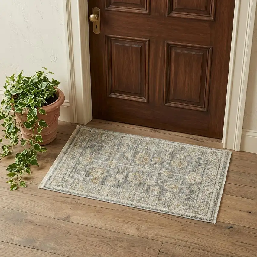 Beige Ivory and Gray Oriental Power Loom Distressed Area Rug With Fringe Photo 1