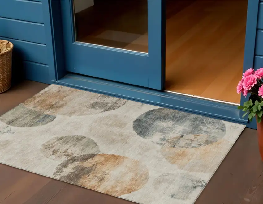 Beige Khaki And Ivory Abstract Washable Indoor Outdoor Area Rug Photo 1