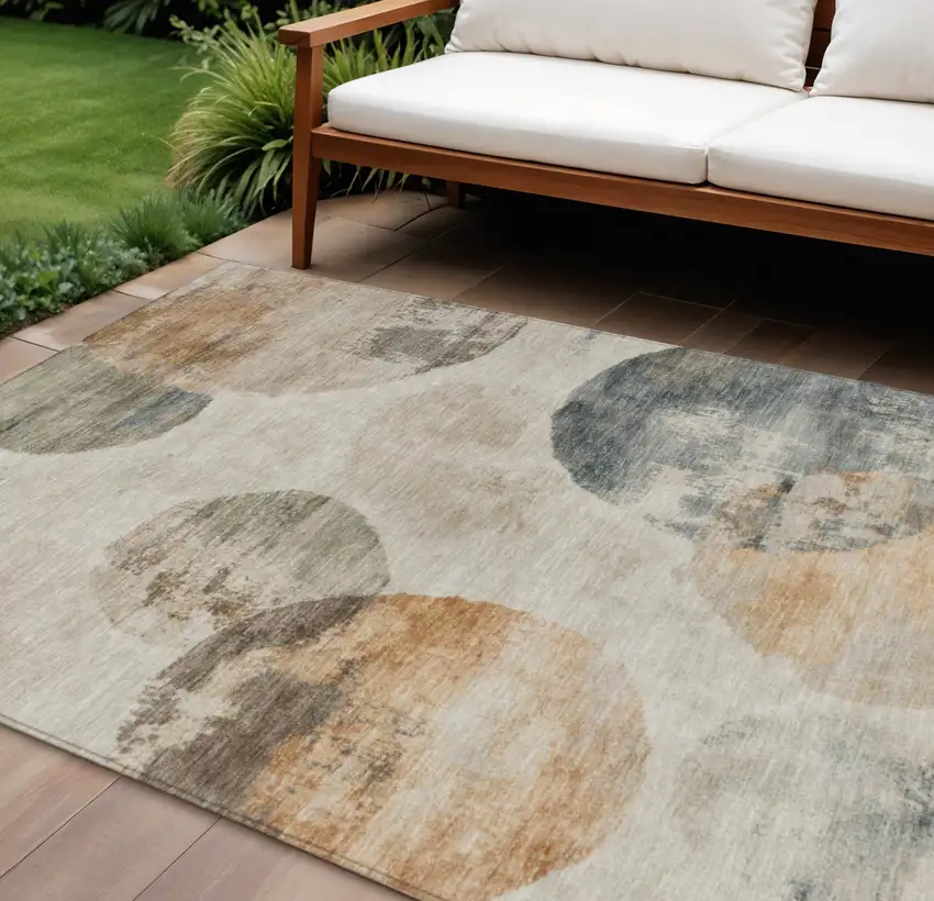 Beige Khaki And Ivory Abstract Washable Indoor Outdoor Area Rug Photo 1