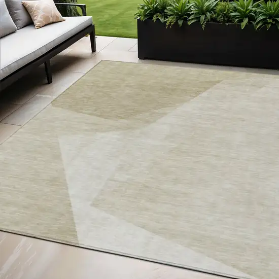 Beige Khaki And Taupe Abstract Washable Indoor Outdoor Area Rug Photo 1