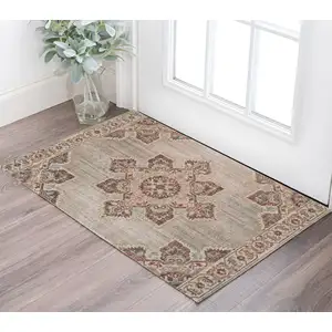 Photo of Beige Medallion Power Loom Area Rug With Fringe