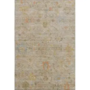 Photo of Beige Orange And Blue Floral Washable Area Rug With UV Protection