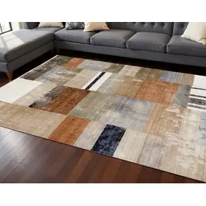 Photo of Beige Orange And Brown Geometric Area Rug