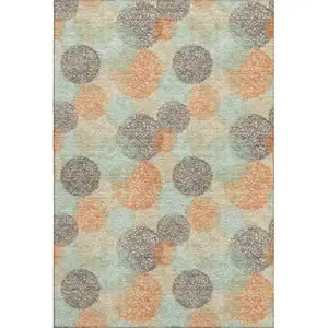 Photo of Beige Orange And Ivory Abstract Washable Area Rug With UV Protection