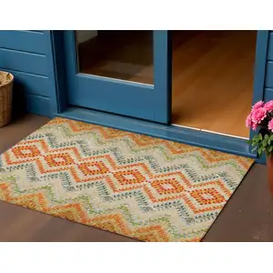 Photo of Beige Orange And Red Geometric Washable Indoor Outdoor Area Rug