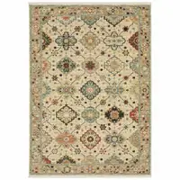 Photo of Beige Pale Blue Rust Gold Tan Brown And Orange Oriental Power Loom Stain Resistant Area Rug With Fringe