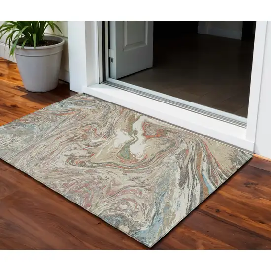 Beige Pink And Blue Abstract Washable Indoor Outdoor Area Rug Photo 1