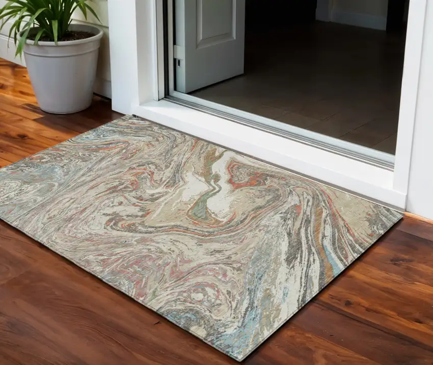 Beige Pink And Blue Abstract Washable Indoor Outdoor Area Rug Photo 1