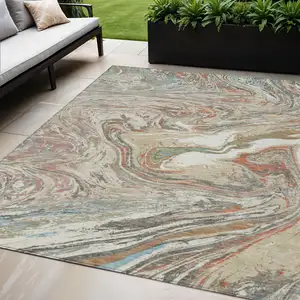 Photo of Beige Pink And Blue Abstract Washable Indoor Outdoor Area Rug