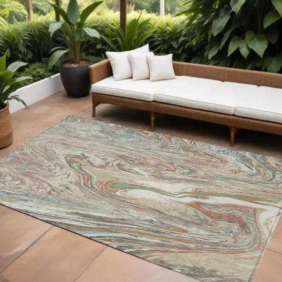 Beige Pink And Blue Abstract Washable Indoor Outdoor Area Rug Photo 1
