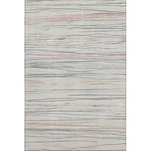 Photo of Beige Pink And Purple Striped Washable Area Rug With UV Protection