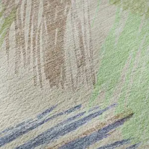 Photo of Beige Purple And Mint Green Striped Washable Area Rug With UV Protection