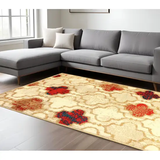 Beige Brown And Red Quatrefoil Distressed Area Rug Photo 1