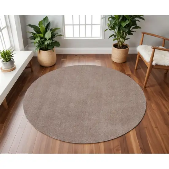 8' Beige Hand Woven Round Rug Photo 1