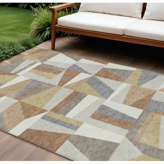 Beige Rust And Taupe Geometric Washable Indoor Outdoor Area Rug Photo 1