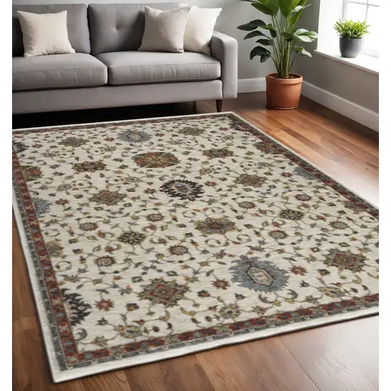 Beige Rust Red Blue Gold And Grey Oriental Power Loom Stain Resistant Area Rug With Fringe Photo 1