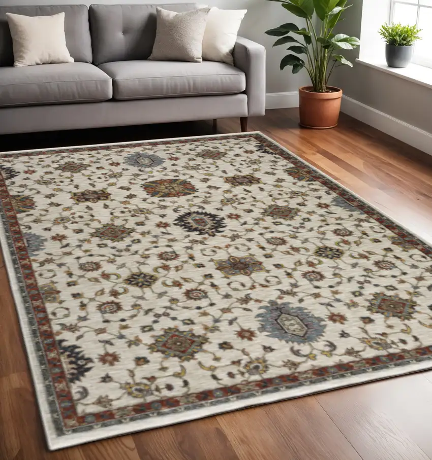 Beige Rust Red Blue Gold And Grey Oriental Power Loom Stain Resistant Area Rug With Fringe Photo 1