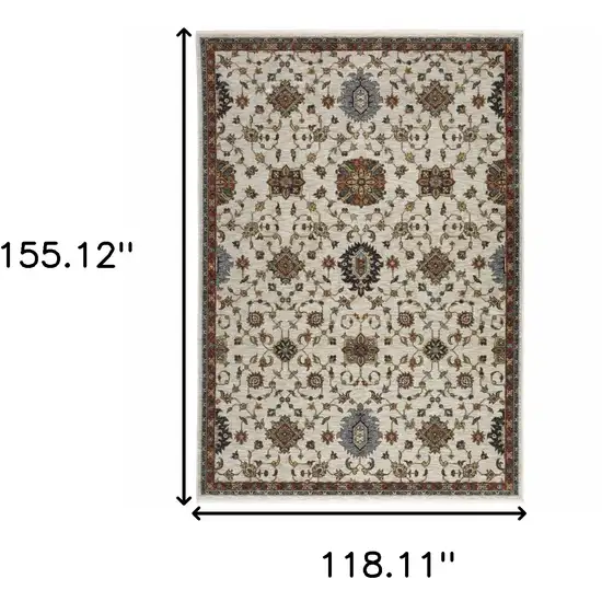 Beige Rust Red Blue Gold And Grey Oriental Power Loom Stain Resistant Area Rug With Fringe Photo 3