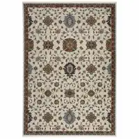Photo of Beige Rust Red Blue Gold And Grey Oriental Power Loom Stain Resistant Area Rug With Fringe