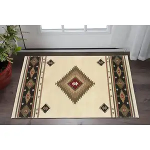 Photo of Beige Southwestern Power Loom Stain Resistant Area Rug