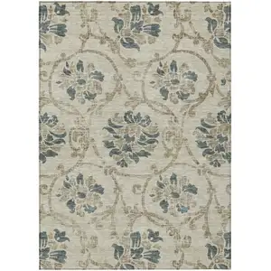 Photo of Beige Tan And Blue Floral Washable Indoor Outdoor Area Rug