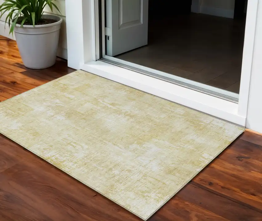 Beige Tan And Ivory Abstract Washable Indoor Outdoor Area Rug Photo 1