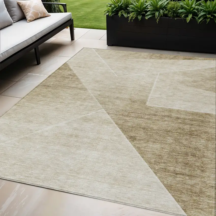 Beige Tan And Ivory Abstract Washable Indoor Outdoor Area Rug Photo 1