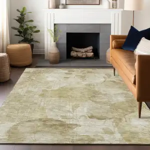 Photo of Beige Tan And Ivory Floral Washable Area Rug With UV Protection