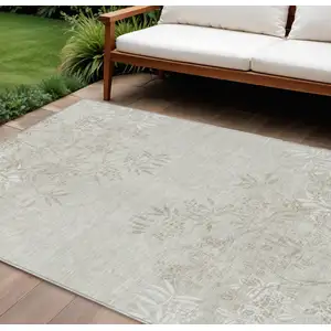 Photo of Beige Tan And Ivory Floral Washable Indoor Outdoor Area Rug