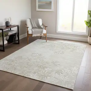 Photo of Beige Tan And Ivory Floral Washable Indoor Outdoor Area Rug