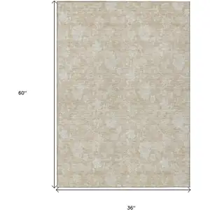 Photo of Beige Tan And Ivory Floral Washable Indoor Outdoor Area Rug