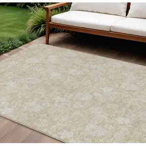 Photo of Beige Tan And Ivory Floral Washable Indoor Outdoor Area Rug