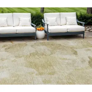 Photo of Beige Tan And Ivory Floral Washable Indoor Outdoor Area Rug