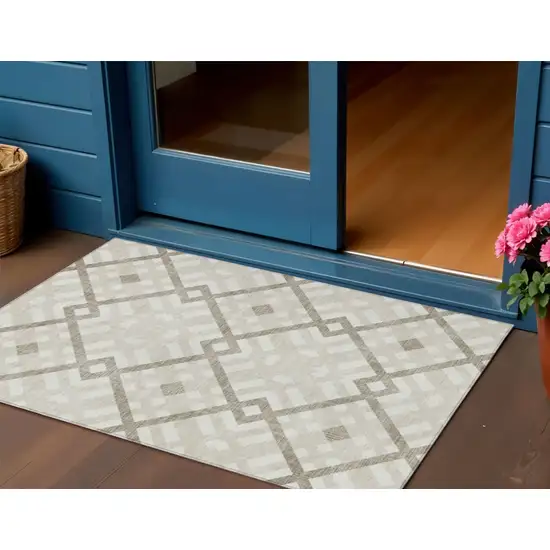 Beige Tan And Ivory Geometric Washable Indoor Outdoor Area Rug Photo 1