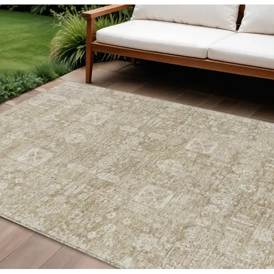Beige Tan And Ivory Oriental Washable Indoor Outdoor Area Rug Photo 1