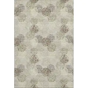 Photo of Beige Tan And Ivory Polka Dot Washable Area Rug With UV Protection