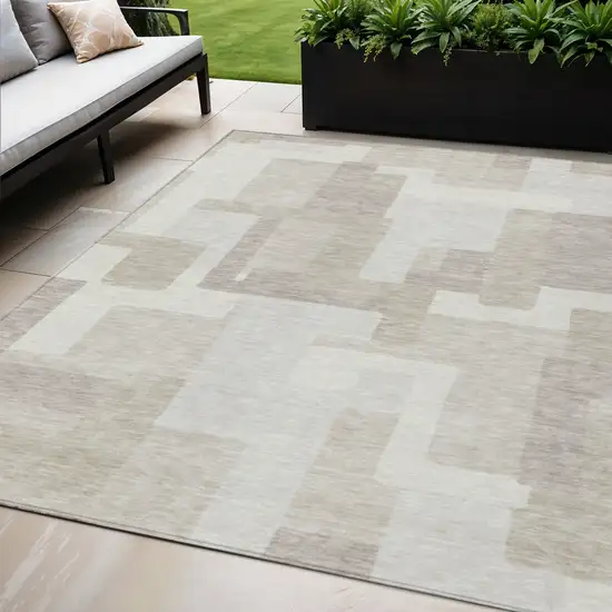 Beige Tan And Taupe Abstract Washable Indoor Outdoor Area Rug Photo 1