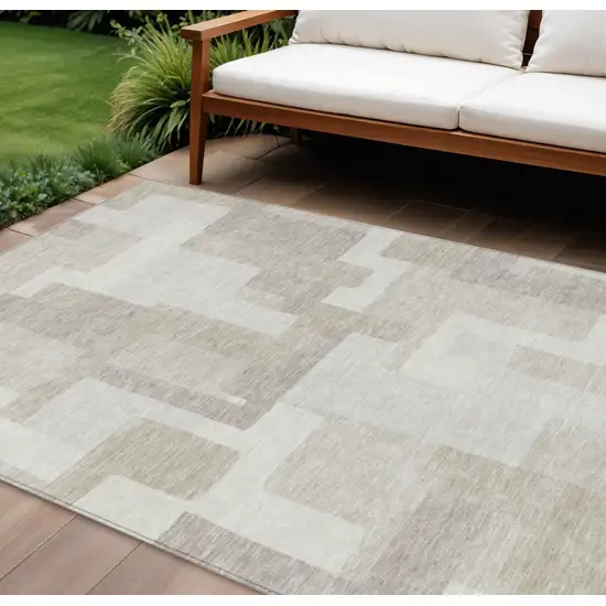 Beige Tan And Taupe Abstract Washable Indoor Outdoor Area Rug Photo 1