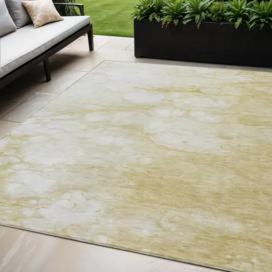 Beige Taupe And Artichoke Green Abstract Washable Indoor Outdoor Area Rug Photo 1