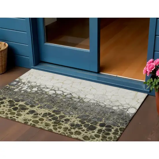 Beige Taupe And Chocolate Abstract Washable Indoor Outdoor Area Rug Photo 1