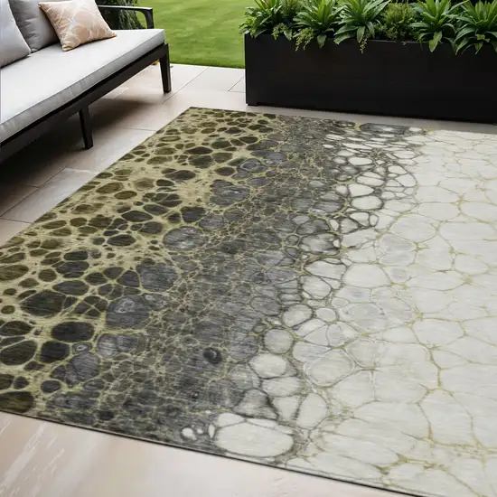 Beige Taupe And Chocolate Abstract Washable Indoor Outdoor Area Rug Photo 1
