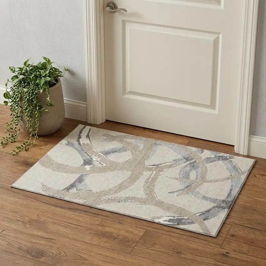 Beige Taupe And Gray Abstract Washable Area Rug With UV Protection Photo 1