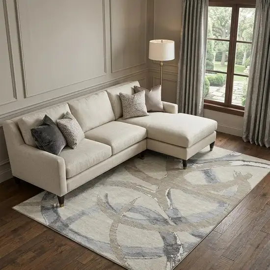 Beige Taupe And Gray Abstract Washable Area Rug With UV Protection Photo 1