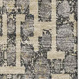 Photo of Beige Taupe And Ivory Abstract Geometric Washable Area Rug With UV Protection