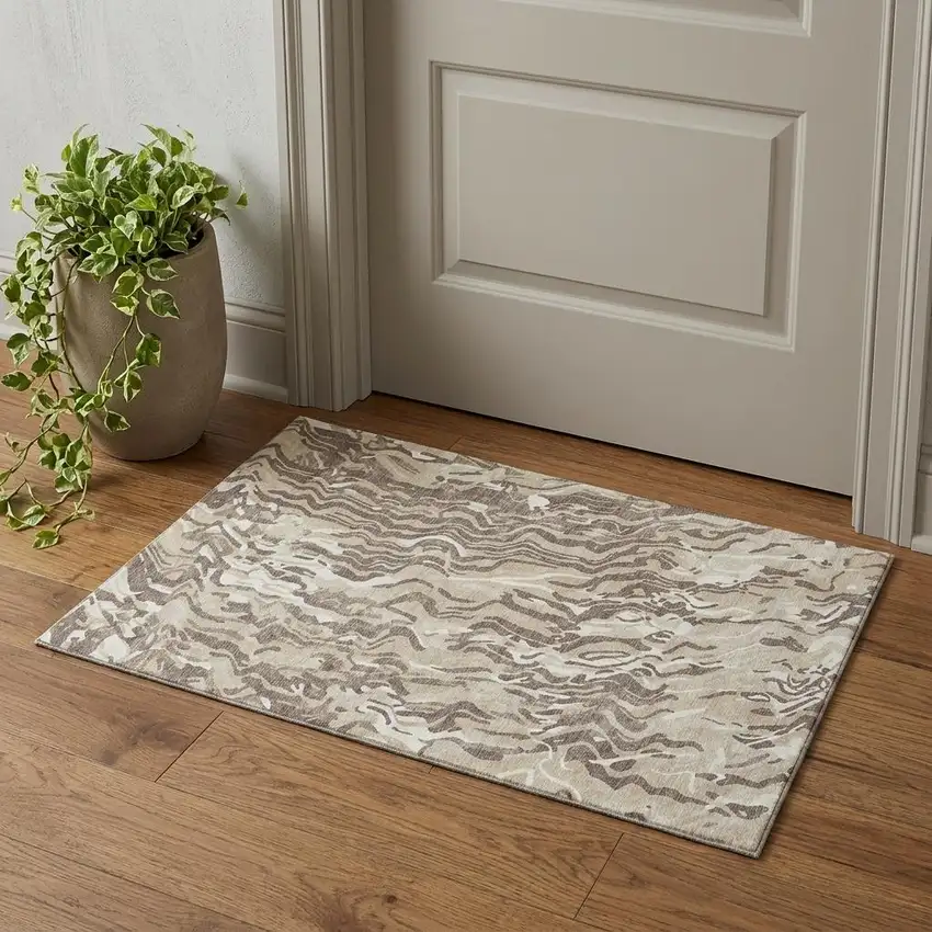 Beige Taupe And Ivory Abstract Washable Area Rug With UV Protection Photo 1