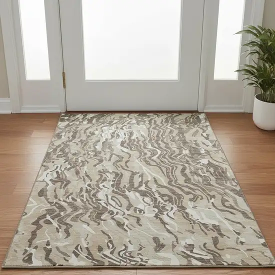 Beige Taupe And Ivory Abstract Washable Area Rug With UV Protection Photo 2